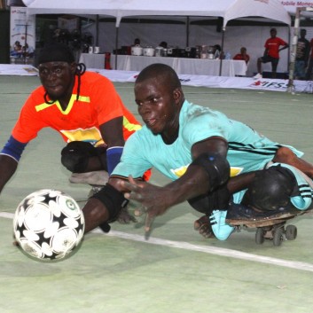 Two players challenging for the ball